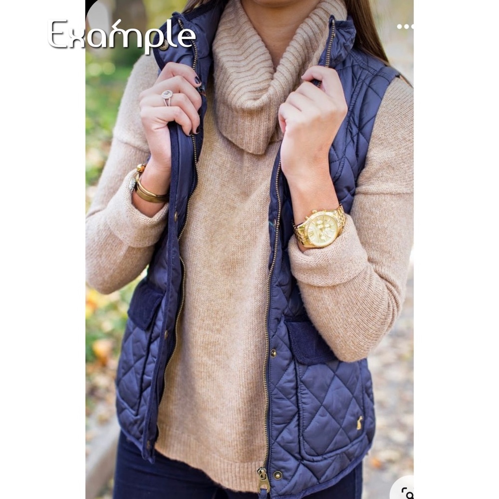 Blue quilted puffer vest . Little Dachshund  dog  logo